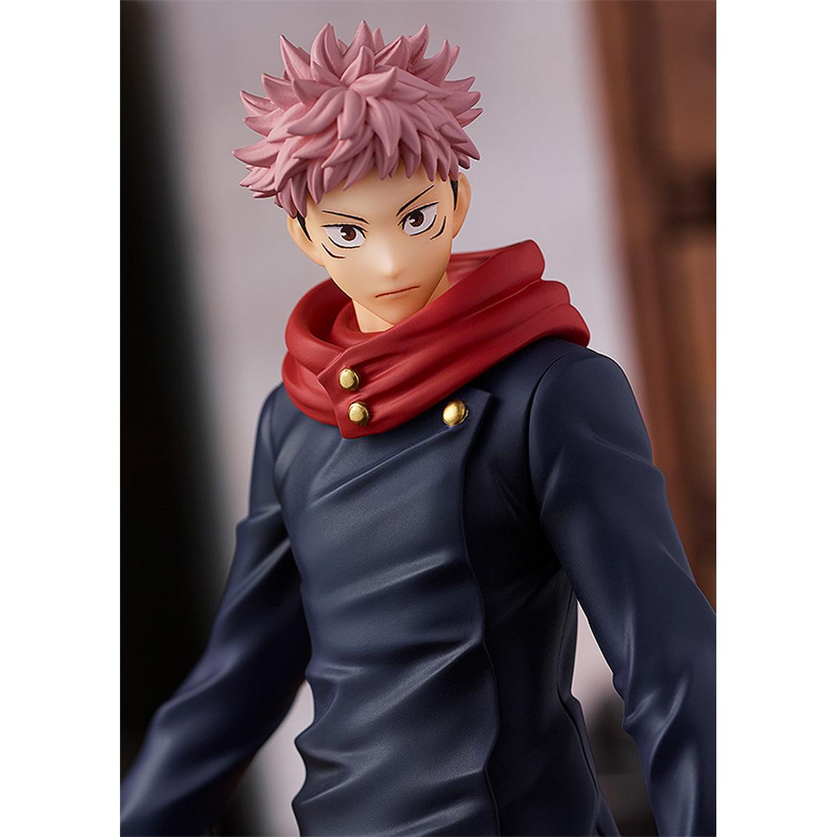 Yuji Itadori figure from Pop Up Parade, posed mid-motion with clenched fist and determined face.