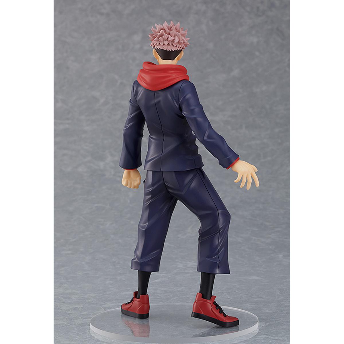 Yuji Itadori figure from Pop Up Parade, posed mid-motion with clenched fist and determined face.