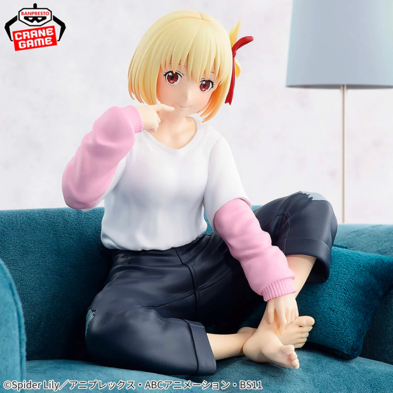 Chisato Nishikigi Relax Time figure from Lycoris Recoil, lounging pose with soft colors.