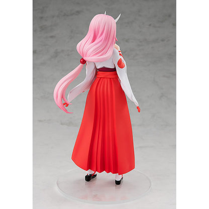 Shuna Pop Up Parade figure in traditional pink outfit, standing with hands together and calm expression.