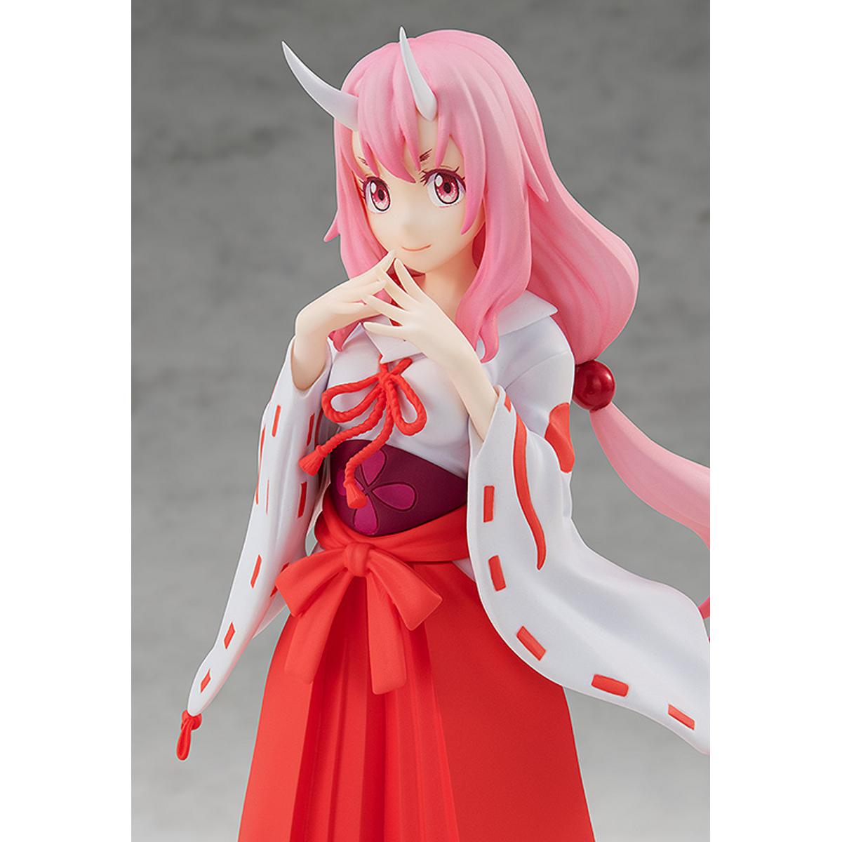 Shuna Pop Up Parade figure in traditional pink outfit, standing with hands together and calm expression.