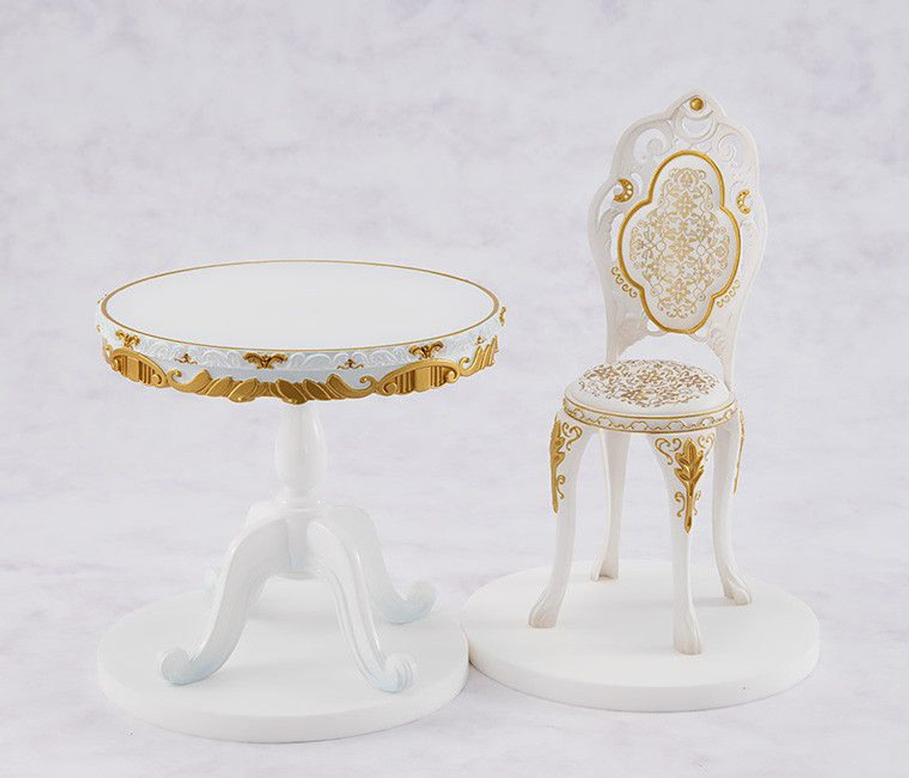 Emilia 1/7 scale Tea Party Ver. figure from Re:ZERO, seated with teacup in elegant white dress.