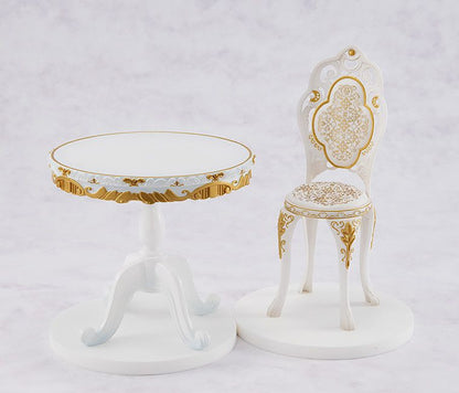 Emilia 1/7 scale Tea Party Ver. figure from Re:ZERO, seated with teacup in elegant white dress.
