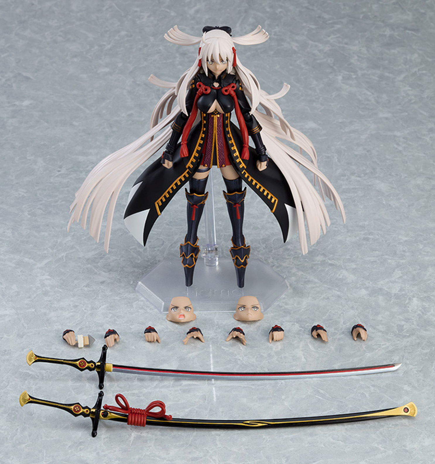 Okita Souji Alter figma figure with dark outfit and katana, featuring multiple faceplates and poses.