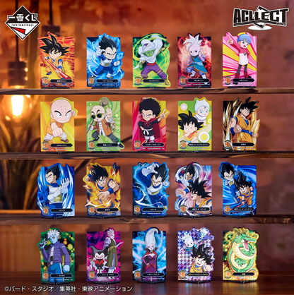 Collection of Ichibankuji - Dragon Ball Daima prizes including mini Son Goku and Kaiōshin figures, Vegeta and Bulma minis, Piccolo and Dende minis, Guldo figure, Son Goku & Vegeta figures, Dragon Ball-themed mug, ring notebook, rubber assortment, visual sheet, ACLLECT items, and a special color Shenron figure
