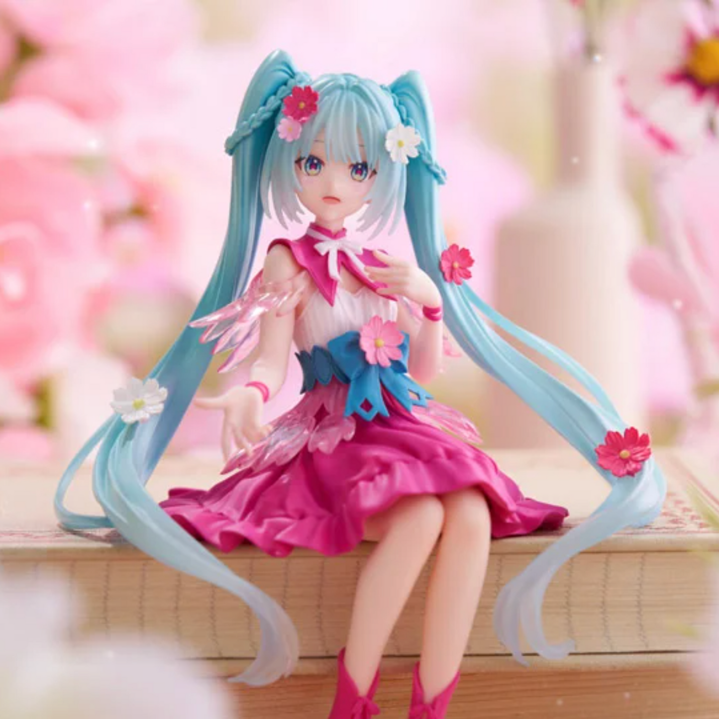 Hatsune Miku - Hatsune Miku Flower Fairy Cosmos Figure - Noodle Stopper,Charming Hatsune Miku figure as a Flower Fairy Cosmos from the Noodle Stopper series featuring whimsical floral accents.